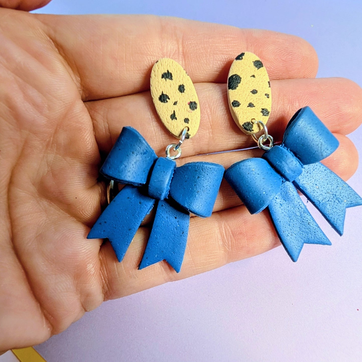 Cerulean Blue Bow Cheetah Dangle Earrings