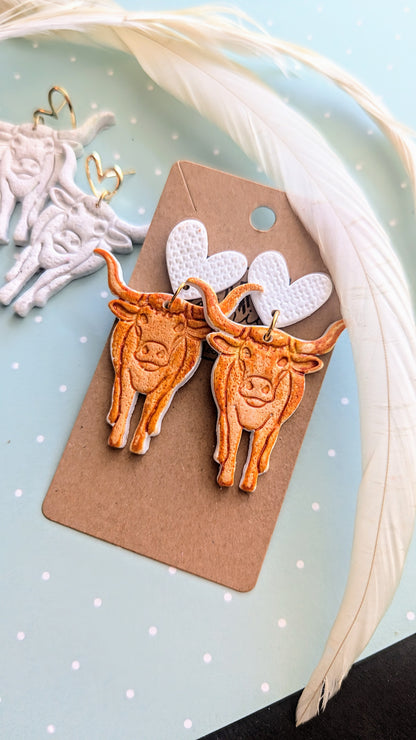 Heart and Longhorn dangle earrings