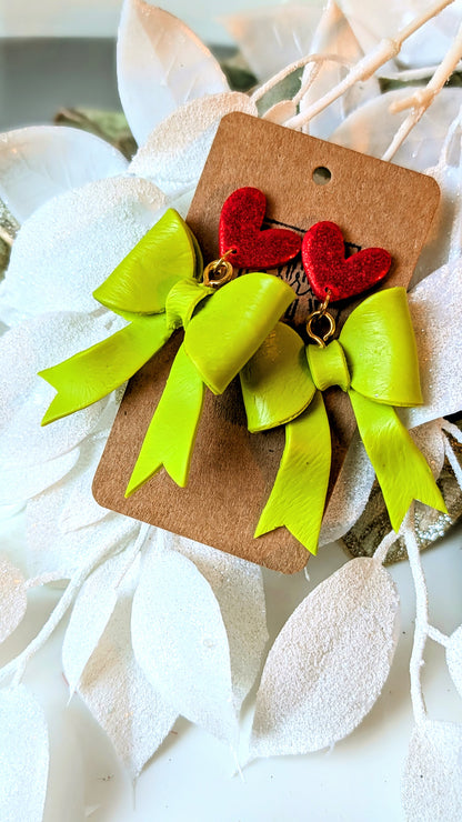 Grinch-y bows polymer clay dangle earrings