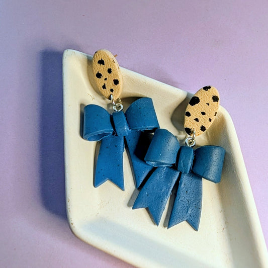Cerulean Blue Bow Cheetah Dangle Earrings