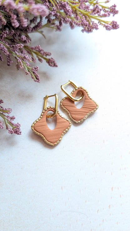 2-in-1! Huggie hoops(can be worn separately) or with interchangeable dangles