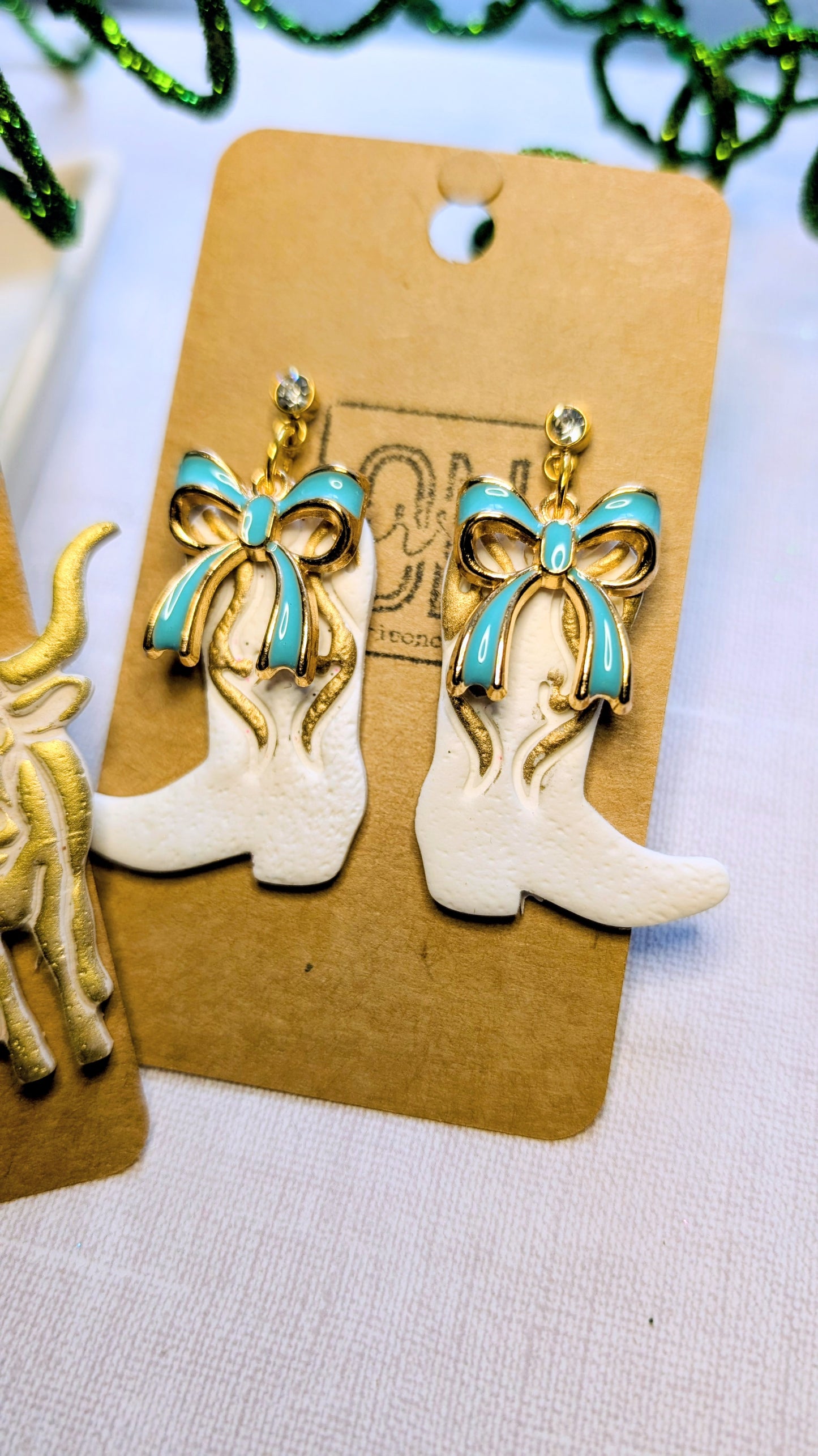 Polymer clay boots and bows dangle earrings